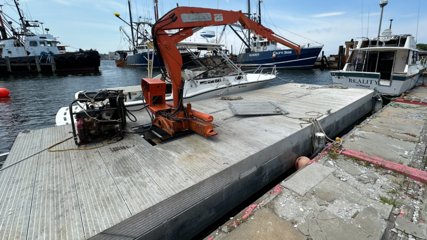 Aluminum barge with excavator